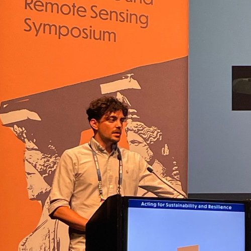 Kostas presenting at a conference